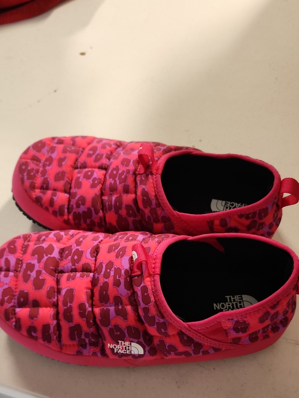The North Face Kids Pink Leopard Slip-On Puffer Shoes